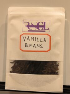 Packaged vanilla beans by Rumali Supreme in a clear-front, labeled bag