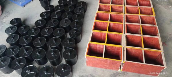 Multiple sealed barrels of Silver Liquid Mercury next to empty wooden crates.