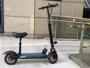 Nairobi e-scooter J11 with seat, parked outdoors