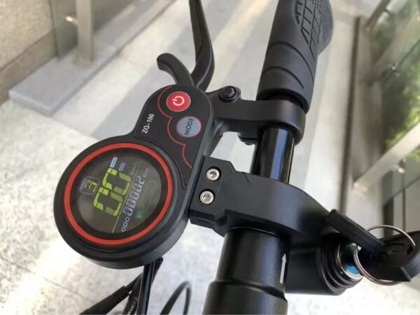 Close-up of the J11 Nairobi e-scooter's handlebar display showing speed and battery status